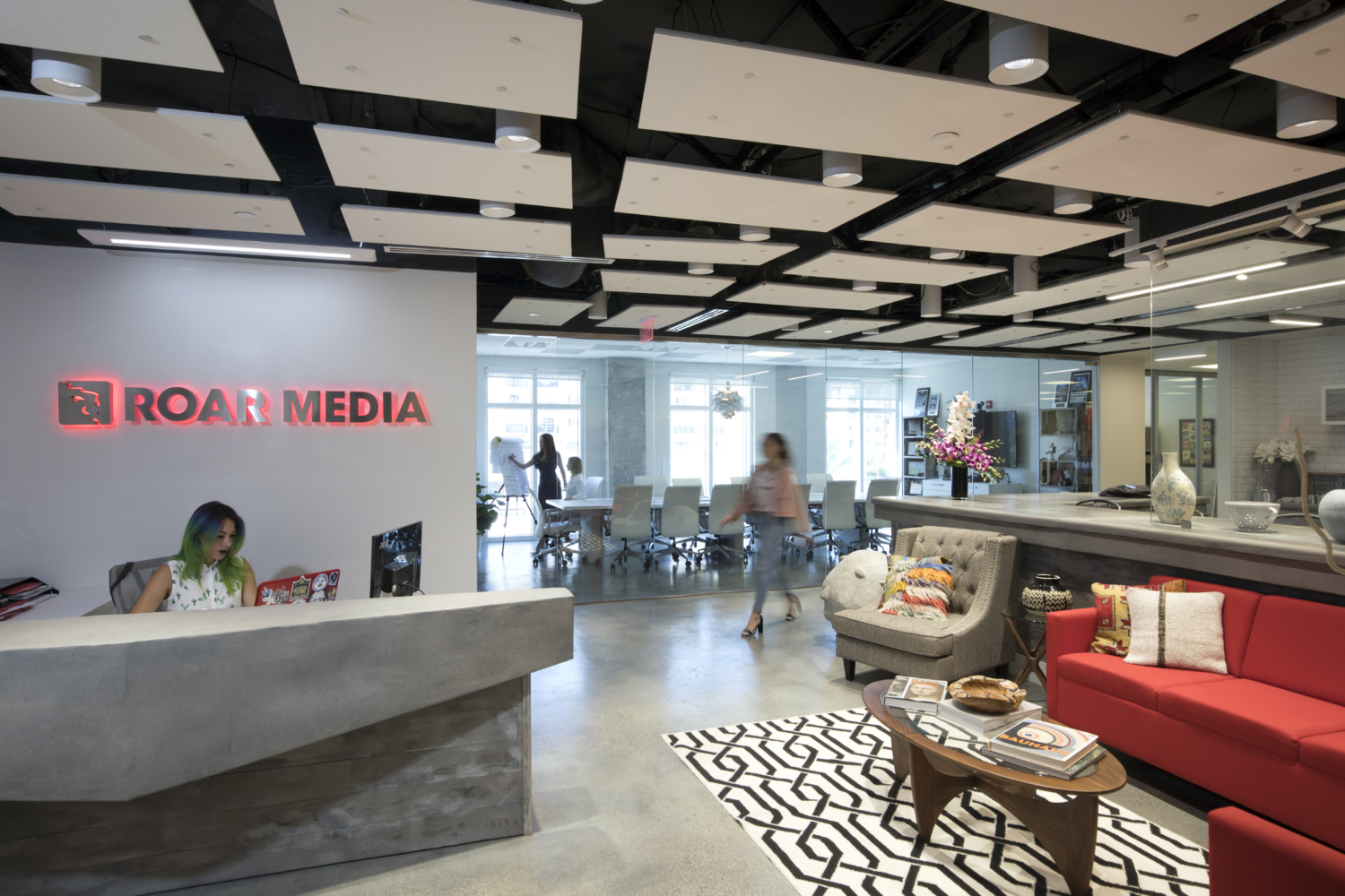 Roar Media — Agency office with neon sign